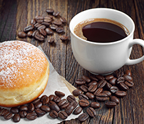 Berliner und Kaffeetasse